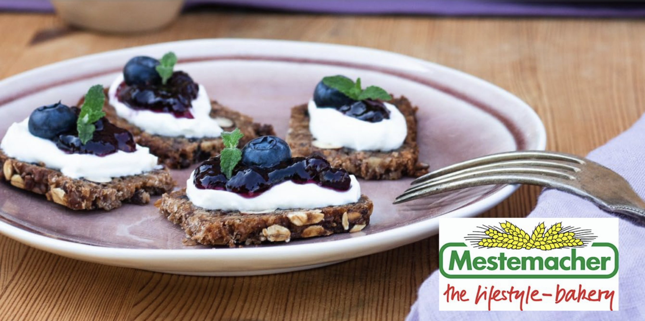 Slice of Mestemacher Low-Calorie Bread on a wooden cutting board, showcasing its hearty texture and whole grain ingredients, ideal for healthy meals and snacks